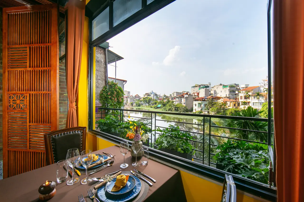 View of water and rooftops from a window table